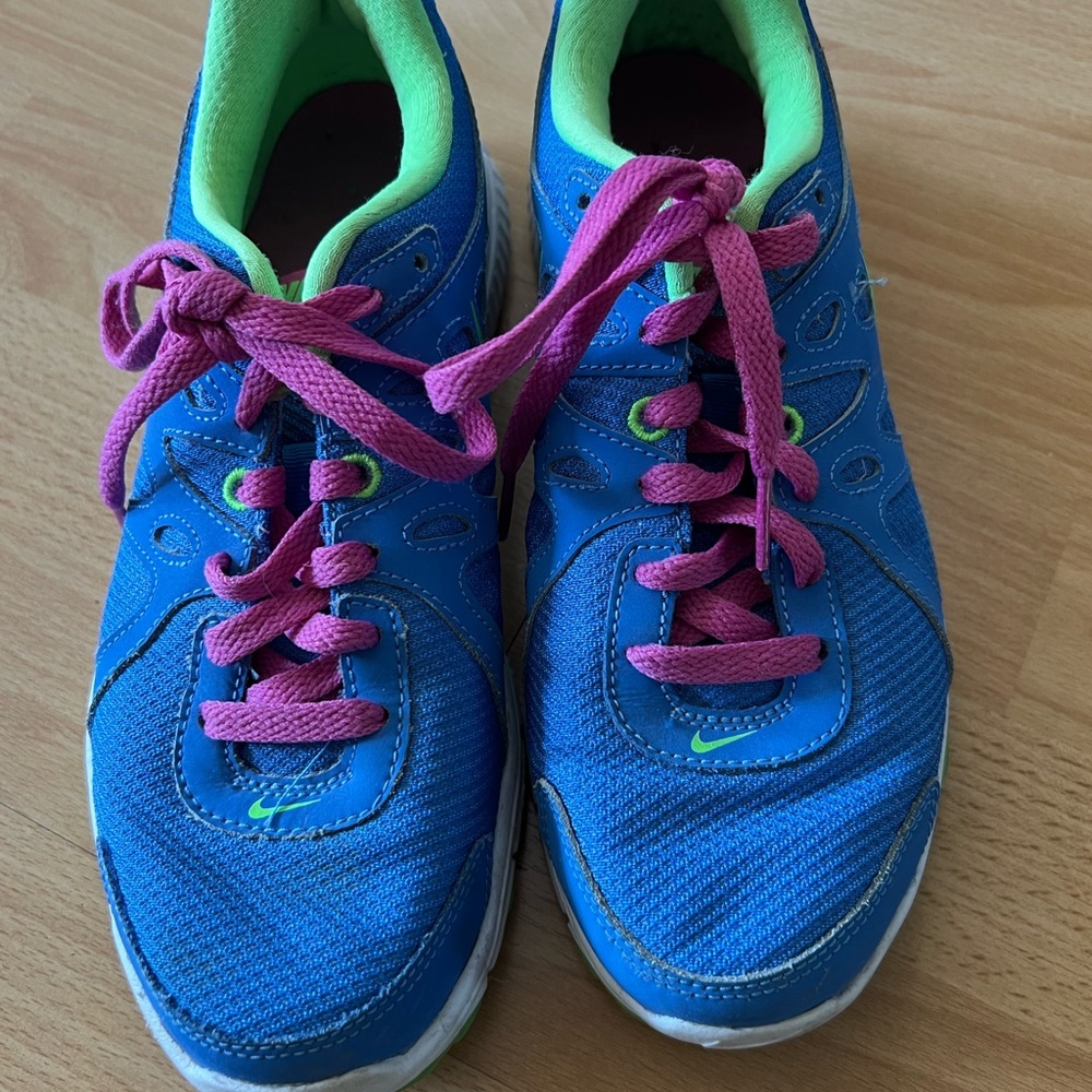 Nike Blue Sneakers with Pink Laces and Green Accents
